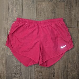 Red Nike running shorts